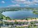 Bird's eye view of condo buildings and parking in the community by the lake at 1460 Lake Shadow Cir # 7102, Maitland, FL 32751