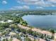 An aerial view of condos next to a lake at 1460 Lake Shadow Cir # 7102, Maitland, FL 32751