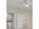 Hallway view of bathroom with granite vanity and tile flooring at 1460 Lake Shadow Cir # 7102, Maitland, FL 32751