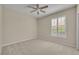 Bedroom with ceiling fan and shuttered window at 1460 Lake Shadow Cir # 7102, Maitland, FL 32751
