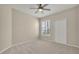 Comfortable bedroom with ceiling fan and shutters at 1460 Lake Shadow Cir # 7102, Maitland, FL 32751