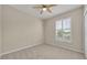 Bedroom with ceiling fan and shuttered window for natural lighting at 1460 Lake Shadow Cir # 7102, Maitland, FL 32751