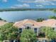 Beautiful condo complex with lake view, lush trees and well-maintained parking area at 1460 Lake Shadow Cir # 7102, Maitland, FL 32751