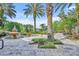Picturesque community grounds with a fountain, lush landscaping, and stone walkways at 1460 Lake Shadow Cir # 7102, Maitland, FL 32751