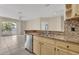 Modern kitchen showcasing granite countertops, stainless steel appliances, and an open layout at 1460 Lake Shadow Cir # 7102, Maitland, FL 32751
