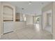 Bright living room features ceramic tile, neutral walls, ceiling fan and sliding doors to the balcony at 1460 Lake Shadow Cir # 7102, Maitland, FL 32751