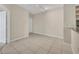 A spacious living area featuring ceramic tile flooring and neutral colored walls at 1460 Lake Shadow Cir # 7102, Maitland, FL 32751