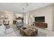 Living room with ceramic tile, neutral walls, ceiling fan and stylish furniture at 1460 Lake Shadow Cir # 7102, Maitland, FL 32751