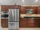 Updated kitchen with stainless appliances and granite counters at 1642 Pennecamp Dr, The Villages, FL 32162