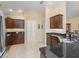 Beautiful kitchen with granite countertops and stainless steel appliances at 1642 Pennecamp Dr, The Villages, FL 32162