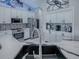 Well-equipped kitchen with stainless steel appliances and a center island at 17563 Se 122Nd Ter, Summerfield, FL 34491