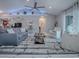 Elegant living room with sleek finishes, comfortable seating, and a contemporary design at 17563 Se 122Nd Ter, Summerfield, FL 34491