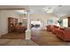 Inviting living space with hardwood floors and access to the dining area and Gathering room at 2096 Callaway Dr, The Villages, FL 32162