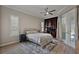 Bedroom featuring a ceiling fan, built in shelving and private entry at 2125 Horizon Run, The Villages, FL 32162