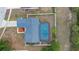 Overhead view of a screened-in pool in the home's backyard with a fenced yard at 2304 Clementine Trl, Clermont, FL 34714