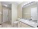 Neutral bathroom with white vanity, sink, toilet, and shower-tub combination at 2304 Clementine Trl, Clermont, FL 34714
