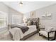 Beautiful bedroom showcasing stylish décor, shutters, and plenty of natural light at 2325 Kenya St, The Villages, FL 32162