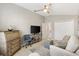 Inviting living room with lots of natural light and cozy furniture at 2325 Kenya St, The Villages, FL 32162
