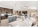 Spacious living area with modern kitchen and dining, ideal for entertaining and Gathering gatherings at 2325 Kenya St, The Villages, FL 32162
