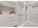 Well-organized walk-in closet with custom shelving and ample space for storage at 2325 Kenya St, The Villages, FL 32162