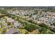 An aerial view showcases the community's layout, landscaping, and the density of single-Gathering homes at 2348 Riley Rd, The Villages, FL 32162