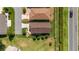 Aerial view of a single-story home with landscaping and a neighboring house at 2348 Riley Rd, The Villages, FL 32162