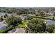 Beautiful single-Gathering homes nestled in a tranquil neighborhood featuring mature trees and well-maintained landscaping at 2348 Riley Rd, The Villages, FL 32162