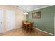 Well-lit dining area with tile floors, perfect for intimate gatherings at 2348 Riley Rd, The Villages, FL 32162