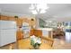 Open-concept kitchen with adjacent dining area and view to the living room at 2348 Riley Rd, The Villages, FL 32162