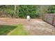 View of the backyard with a water well and a wooden fence at 254 Locust Pass Dr, Ocala, FL 34472