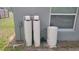 Water filtration system located on the exterior of the home near a window at 254 Locust Pass Dr, Ocala, FL 34472