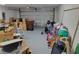 A two car garage filled with boxes and other items at 254 Locust Pass Dr, Ocala, FL 34472
