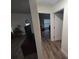 Hallway showing access to living room and bedroom at 254 Locust Pass Dr, Ocala, FL 34472