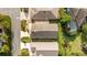 An aerial view of a single-story home's roof and layout within the surrounding neighborhood at 2564 Red Cedar Ln, The Villages, FL 32162