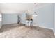 Spacious living area with stylish flooring and open access to the kitchen at 2564 Red Cedar Ln, The Villages, FL 32162
