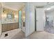 Retro bathroom with a floral motif wallpaper, a vanity, and a separated shower room for a unique aesthetic at 2706 Vindale Rd, Tavares, FL 32778