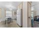 Cozy dining area with white cabinets and a breakfast nook, providing a comfortable space for meals and gatherings at 2706 Vindale Rd, Tavares, FL 32778