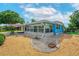 Charming exterior view showcasing well-maintained landscaping and inviting curb appeal at 2706 Vindale Rd, Tavares, FL 32778