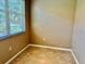 Bright room featuring tile floors, neutral walls, and a sunlit window at 3083 Pinnacle Ct, Clermont, FL 34711