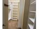 Spacious walk-in closet with custom shelving and ample storage space at 3083 Pinnacle Ct, Clermont, FL 34711