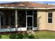 Home's screened in lanai provides a comfortable area for enjoying the outdoors at 3083 Pinnacle Ct, Clermont, FL 34711
