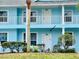Exterior view of condo showing the front door, balcony, and nice landscaping at 3107 Sun Lake Ct # A, Kissimmee, FL 34747
