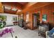 Charming room features tile flooring, wood accents, skylights, antique desk and decorative furnishings at 33637 E Lake Joanna Dr, Eustis, FL 32736