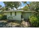 Exterior view of an outbuilding, offering additional storage or workshop space on the property at 33637 E Lake Joanna Dr, Eustis, FL 32736
