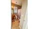 Neutral bathroom featuring a shower with a floral curtain, tile floors, and a vanity with a wood cabinet at 33818 Venice Ln, Sorrento, FL 32776