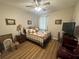 Bedroom featuring hard flooring, neutral walls, and comfortable furnishings at 33818 Venice Ln, Sorrento, FL 32776