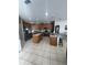 Spacious kitchen featuring stone countertops, stainless steel appliances, and lots of cabinet space at 33818 Venice Ln, Sorrento, FL 32776
