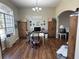 Bright living room with lots of natural light, hardwood flooring, and stylish decor at 33818 Venice Ln, Sorrento, FL 32776