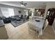 Open living space with tile flooring, modern furnishings, and lots of natural light at 33818 Venice Ln, Sorrento, FL 32776