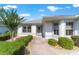 Inviting front walkway leading to a charming entrance with well-maintained landscaping at 3393 Talley Ridge Dr, The Villages, FL 32162